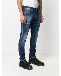 dunkelblaue enge Jeans mit Destroyed-Effekten von Dondup