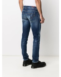 dunkelblaue enge Jeans mit Destroyed-Effekten von Dondup