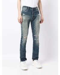 dunkelblaue enge Jeans mit Destroyed-Effekten von Ksubi