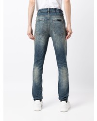 dunkelblaue enge Jeans mit Destroyed-Effekten von Ksubi