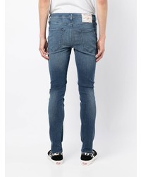 dunkelblaue enge Jeans mit Destroyed-Effekten von True Religion