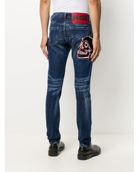 dunkelblaue enge Jeans mit Destroyed-Effekten von Philipp Plein