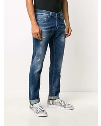 dunkelblaue enge Jeans mit Destroyed-Effekten von Dondup