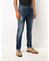 dunkelblaue enge Jeans mit Destroyed-Effekten von Dondup