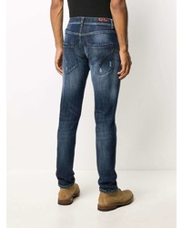 dunkelblaue enge Jeans mit Destroyed-Effekten von Dondup