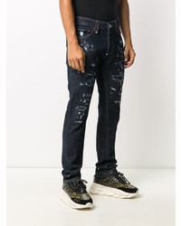 dunkelblaue enge Jeans mit Destroyed-Effekten von Philipp Plein