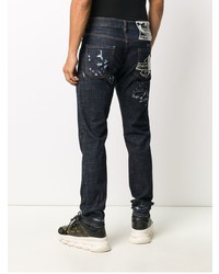 dunkelblaue enge Jeans mit Destroyed-Effekten von Philipp Plein