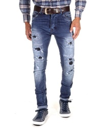 dunkelblaue enge Jeans mit Destroyed-Effekten von EX-PENT