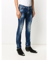 dunkelblaue enge Jeans mit Destroyed-Effekten von John Richmond