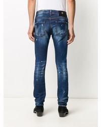 dunkelblaue enge Jeans mit Destroyed-Effekten von John Richmond