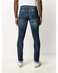 dunkelblaue enge Jeans mit Destroyed-Effekten von Dondup