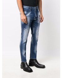 dunkelblaue enge Jeans mit Destroyed-Effekten von Philipp Plein