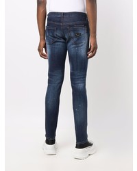 dunkelblaue enge Jeans mit Destroyed-Effekten von Philipp Plein