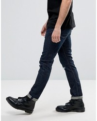 dunkelblaue enge Jeans mit Destroyed-Effekten von AllSaints