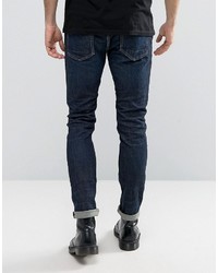 dunkelblaue enge Jeans mit Destroyed-Effekten von AllSaints