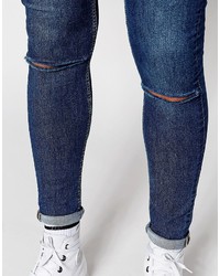 dunkelblaue enge Jeans mit Destroyed-Effekten von Cheap Monday