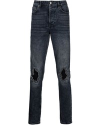 dunkelblaue enge Jeans mit Destroyed-Effekten von Ksubi
