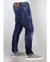 dunkelblaue enge Jeans mit Destroyed-Effekten von Le Temps des Cerises
