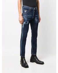 dunkelblaue enge Jeans mit Destroyed-Effekten von Philipp Plein