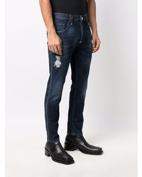 dunkelblaue enge Jeans mit Destroyed-Effekten von Philipp Plein