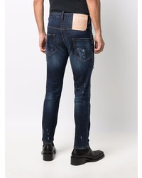 dunkelblaue enge Jeans mit Destroyed-Effekten von Philipp Plein