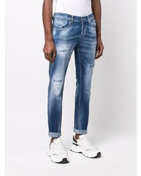 dunkelblaue enge Jeans mit Destroyed-Effekten von Dondup