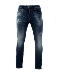 dunkelblaue enge Jeans mit Destroyed-Effekten von Miracle of Denim