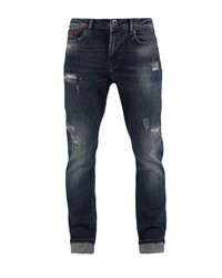dunkelblaue enge Jeans mit Destroyed-Effekten von Miracle of Denim