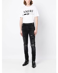 dunkelblaue enge Jeans mit Destroyed-Effekten von Amiri