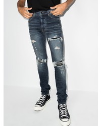 dunkelblaue enge Jeans mit Destroyed-Effekten von Amiri