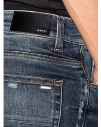 dunkelblaue enge Jeans mit Destroyed-Effekten von Amiri