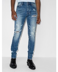 dunkelblaue enge Jeans mit Destroyed-Effekten von Ksubi