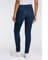 dunkelblaue enge Jeans mit Destroyed-Effekten von Only
