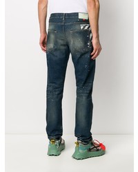 dunkelblaue enge Jeans mit Destroyed-Effekten von Off-White