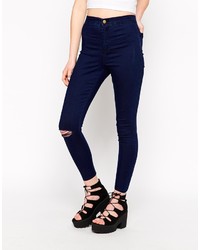 dunkelblaue enge Jeans mit Destroyed-Effekten von Asos