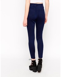 dunkelblaue enge Jeans mit Destroyed-Effekten von Asos