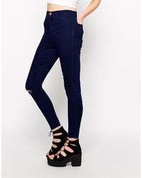 dunkelblaue enge Jeans mit Destroyed-Effekten von Asos