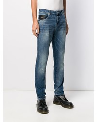 dunkelblaue enge Jeans mit Destroyed-Effekten von John Richmond