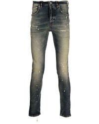 dunkelblaue enge Jeans mit Destroyed-Effekten von purple brand
