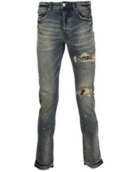 dunkelblaue enge Jeans mit Destroyed-Effekten von purple brand