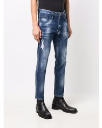 dunkelblaue enge Jeans mit Destroyed-Effekten von Philipp Plein