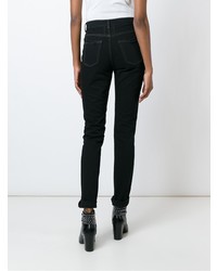 dunkelblaue enge Jeans mit Destroyed-Effekten von Saint Laurent