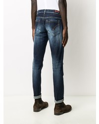 dunkelblaue enge Jeans mit Destroyed-Effekten von Dondup