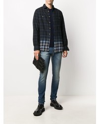 dunkelblaue enge Jeans mit Destroyed-Effekten von 7 For All Mankind