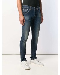 dunkelblaue enge Jeans mit Destroyed-Effekten von Dondup