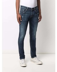 dunkelblaue enge Jeans mit Destroyed-Effekten von Dondup