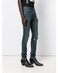 dunkelblaue enge Jeans mit Destroyed-Effekten von Saint Laurent