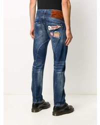 dunkelblaue enge Jeans mit Destroyed-Effekten von Philipp Plein