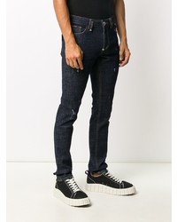 dunkelblaue enge Jeans mit Destroyed-Effekten von Philipp Plein