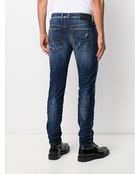 dunkelblaue enge Jeans mit Destroyed-Effekten von Diesel